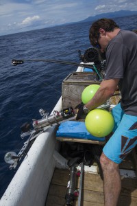 Phillips prepares to deploy a lightweight deep-sea drop camera in the Solomon Islands. (Image:: Alex DeCiccio)