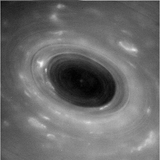 Cassini shoots through the gap between Saturn and its rings, returning the closest views ever of the planet