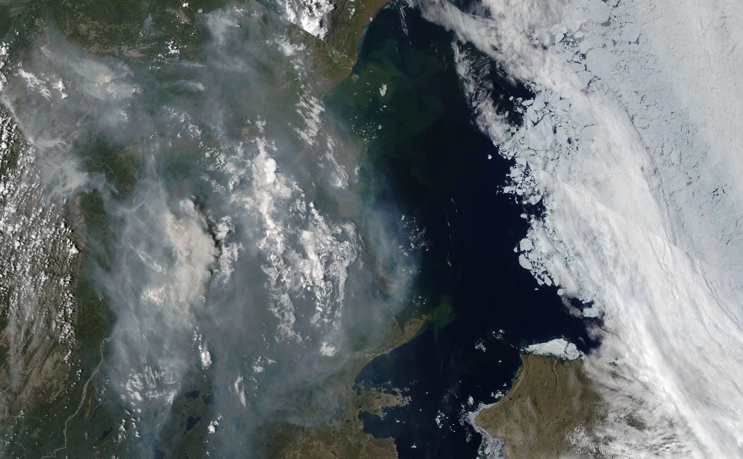 Smoke from wildfires burning in Canada's Yukon Territory and the Northern Territories is seen in this image acquired by NASA's Terra satellite on July 8, 2017. Sea ice in the Beaufort Sea is visible to the north, which in this image is to the right. (Source: NASA Worldview)