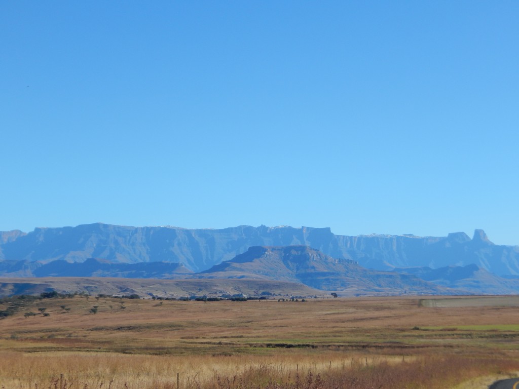 The mountainous Southern African country of Lesotho, seen on the horizon, is home to some of the continent's most intriguing dinosaurs. (Credit G. Tarlach)
