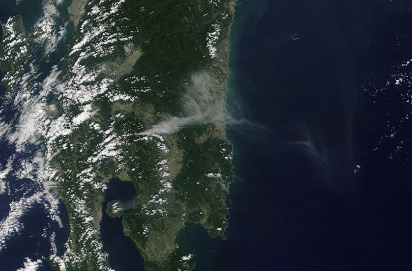 The grey plume of ash from the eruption of Kirishima, seen clearly against the green on Kyushu. Image taken October 12, 2017 (local) by NASA's Terra MODIS imager.