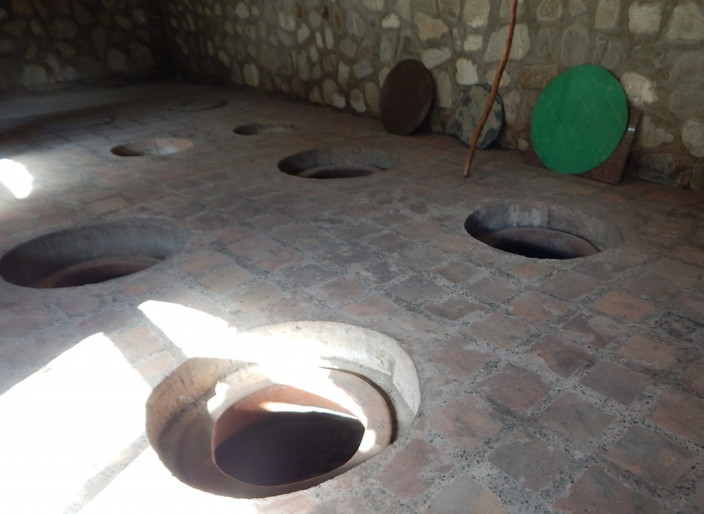 Traditional wine-making in the Republic of Georgia, even today, relies on large, distinctively shaped clay containers called qvevri, which are buried or built into cellars. The shape of the qvevri is similar to the vessel found at Khramis Didi-Gora. Credit: G. Tarlach