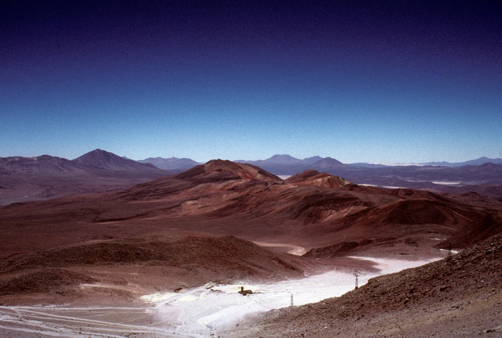 A view from near the summit of Aucanquilcha, with the mine works and cable car line visible in the foreground. Erik Klemetti