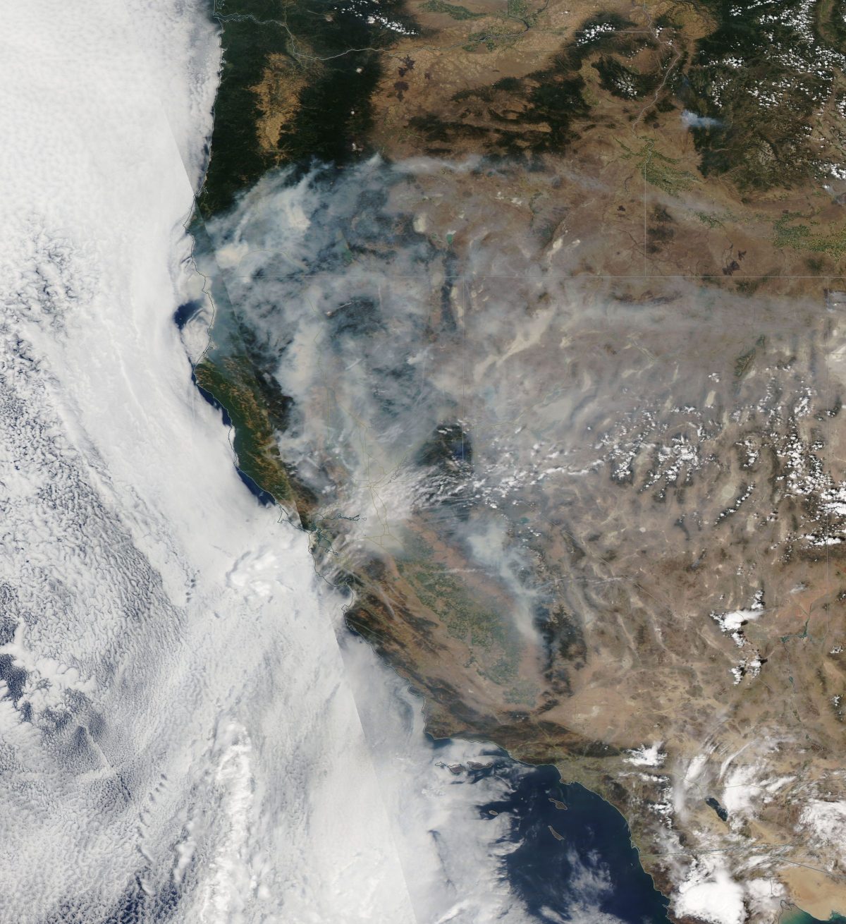 Satellite imagery reveals a shocking blanket of thick smoke smothering huge portions of California and Oregon