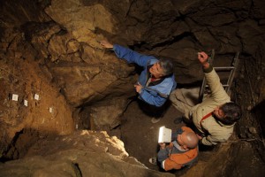Archaeologists working in the in the East Chamber of Denisova Cave, Russia. (Credit: IAET SB RAS, Sergei Zelensky)