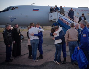 This is the moment that astronauts Alexey Ovchinin and Nick Hague were reunited with their families at the Baikonur Cosmodrome, after a flight back from their emergency landing zone. (Credit: NASA/Bill Ingalls) 