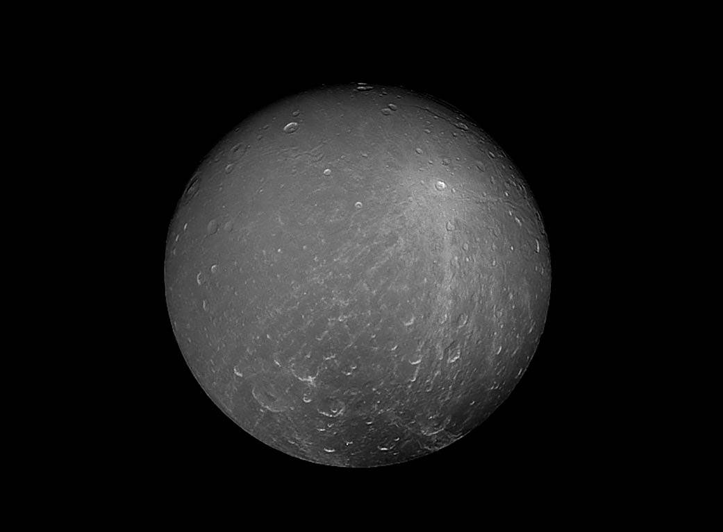 Saturn's Moon Dione Has Mysterious Stripes All Across Its Surface